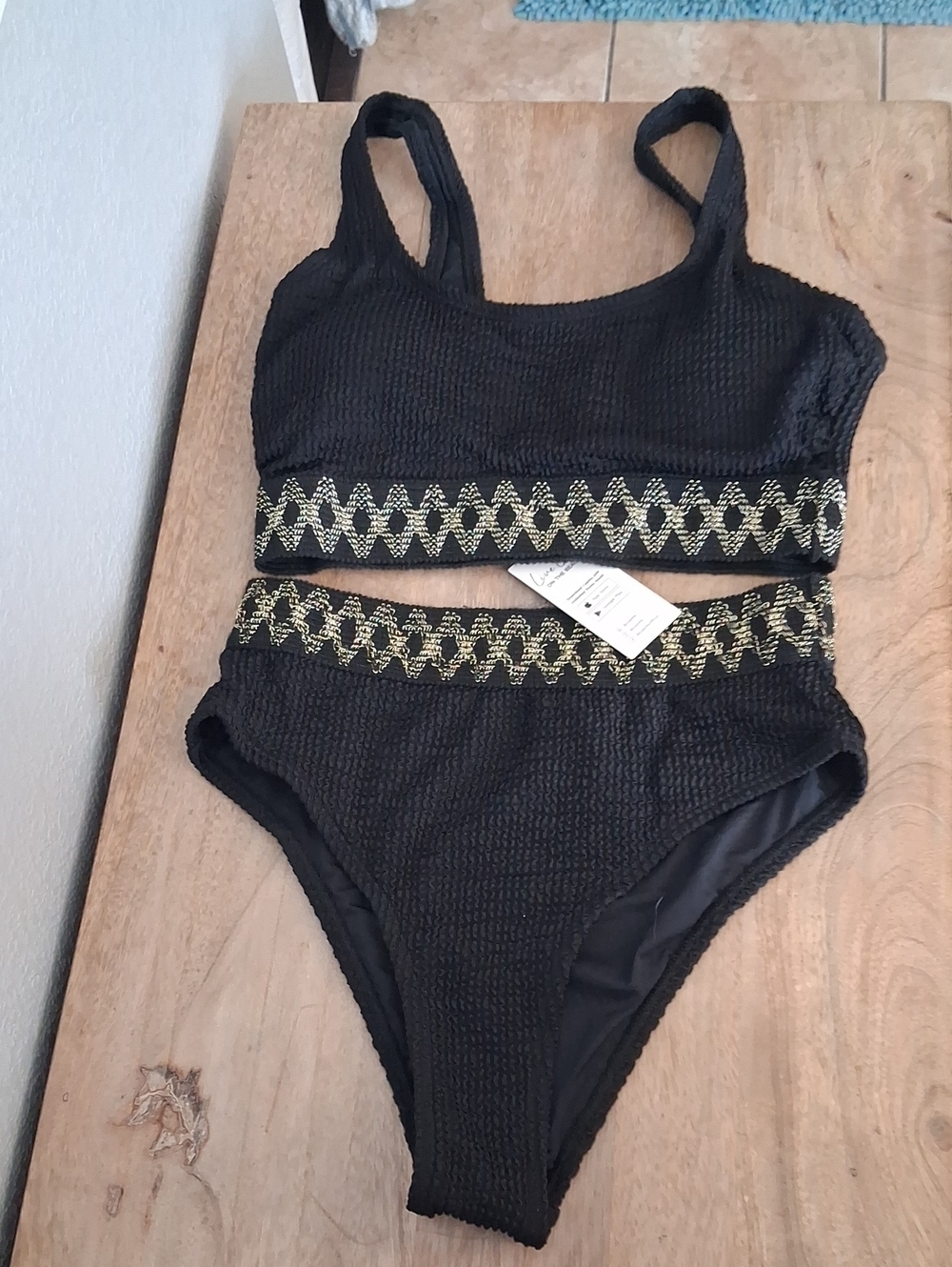 Black Two-Piece Textured Bikini with Gold Trim